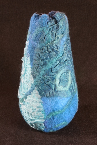 Turquoise felt vase with silk details